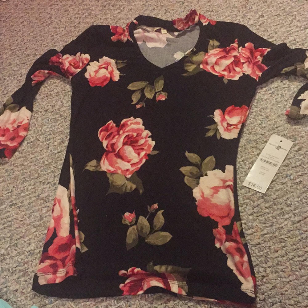 Black blouse with roses.